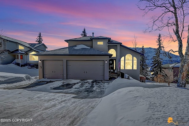 view of front of house featuring driveway and an attached garage