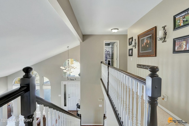 20420 Williamsburg Dr, Eagle River, AK 99577 - stairway with a chandelier and baseboards