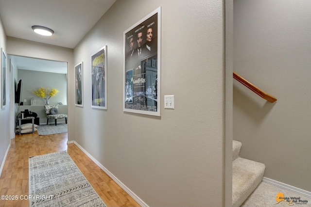 20420 Williamsburg Dr, Eagle River, AK 99577 - hall featuring wood finished floors, stairs, and baseboards