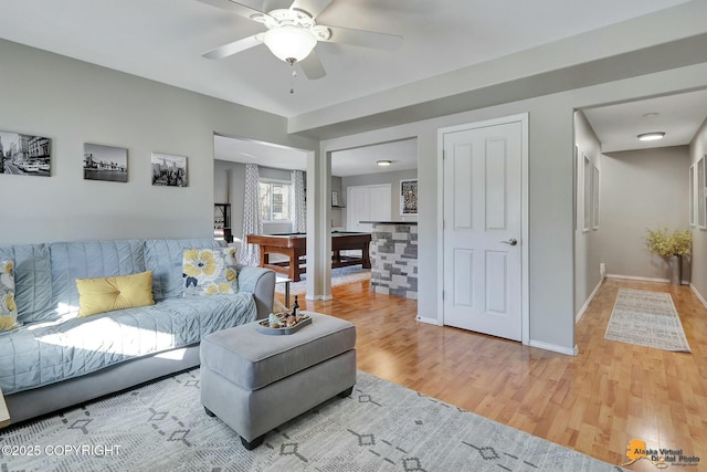 20420 Williamsburg Dr, Eagle River, AK 99577 - living room featuring light wood-style flooring and a ceiling fan