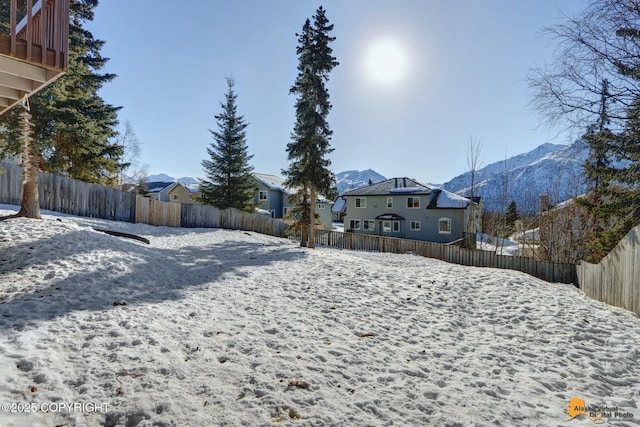 20420 Williamsburg Dr, Eagle River, AK 99577 - snowy yard featuring a mountain view and a residential view