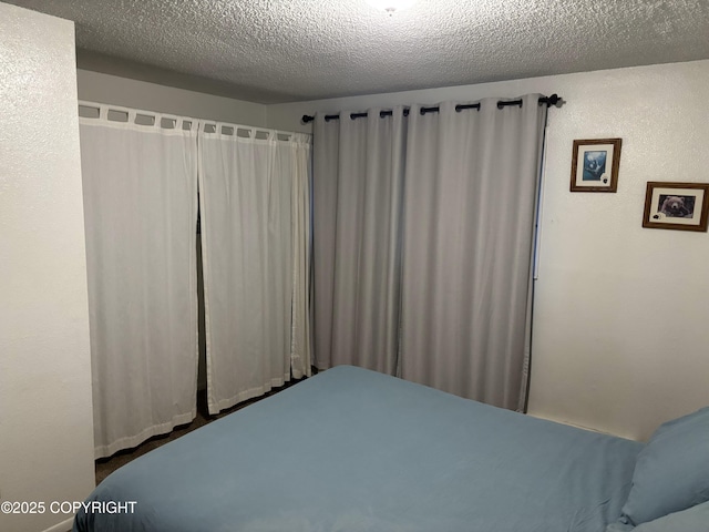 bedroom with a textured ceiling