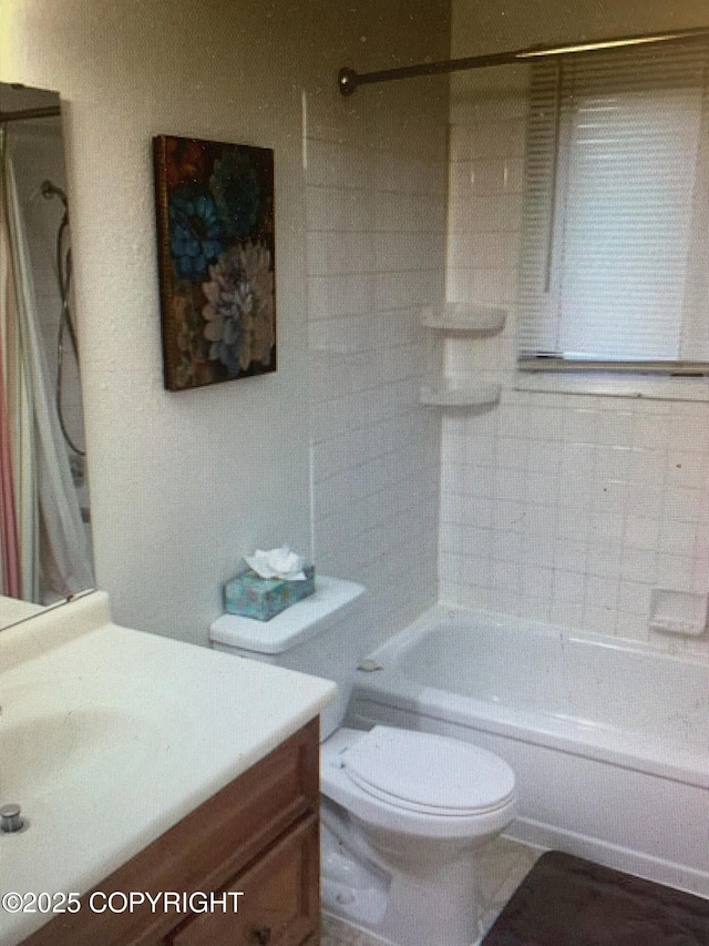 full bath with shower / bath combination, vanity, and toilet