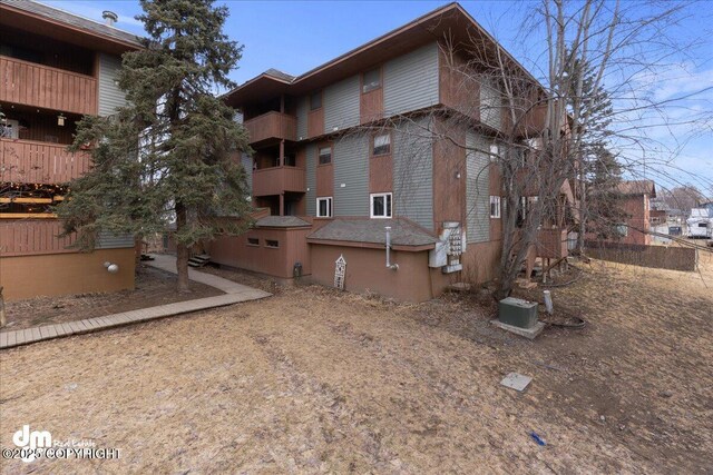 view of property featuring central air condition unit