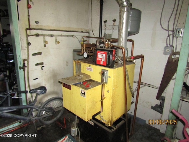 utility room featuring a heating unit