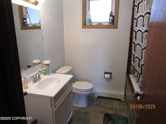 bathroom featuring toilet, shower / tub combo, a baseboard heating unit, and vanity