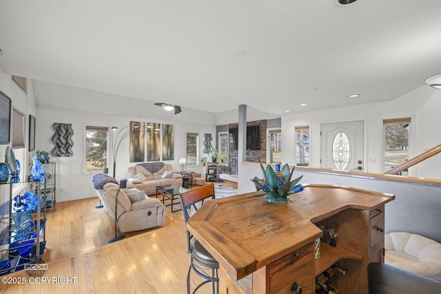 dining space featuring recessed lighting and light wood-style floors