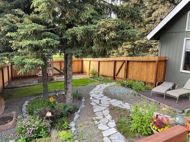 view of yard with a patio and a fenced backyard