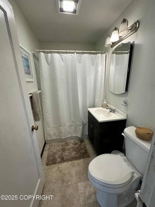 full bath featuring visible vents, shower / bathtub combination with curtain, toilet, vanity, and tile patterned floors