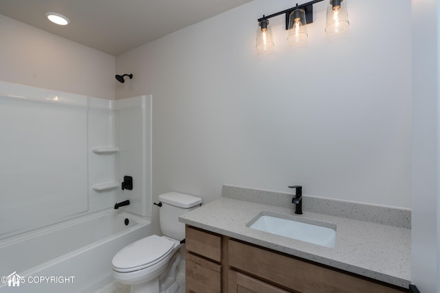 full bath featuring toilet, bathing tub / shower combination, and vanity