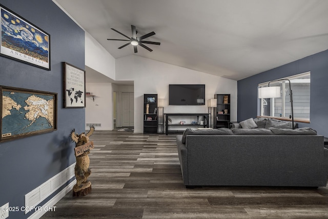 living room with dark wood-style floors, vaulted ceiling, a ceiling fan, baseboards, and visible vents