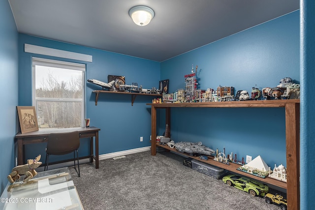 bedroom featuring baseboards, visible vents, and carpet