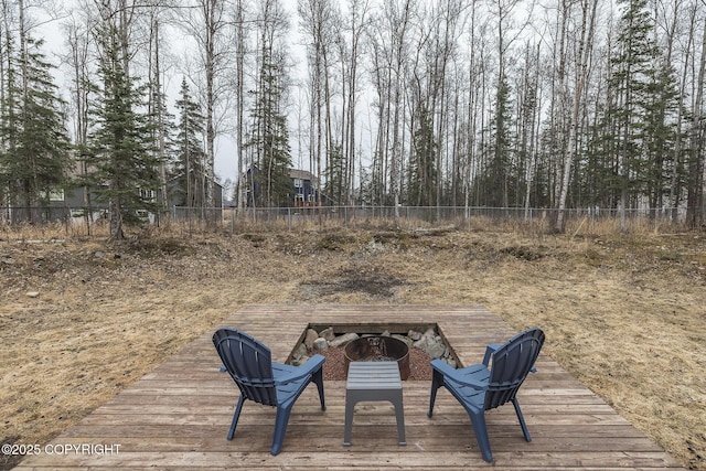 wooden deck featuring fence