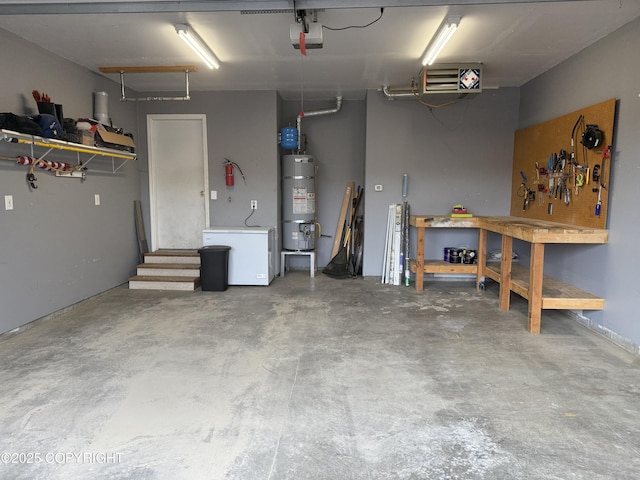 garage featuring refrigerator, water heater, a workshop area, and a garage door opener
