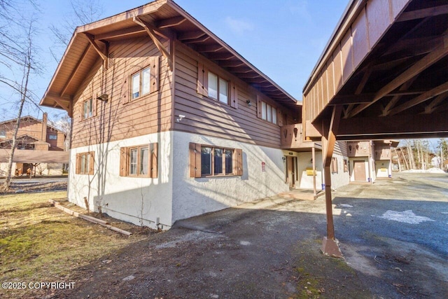 view of property exterior with stucco siding