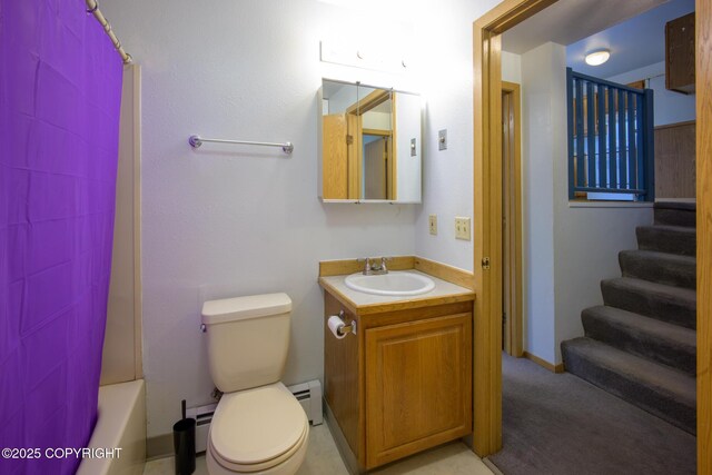 full bath with toilet, shower / bath combo with shower curtain, baseboard heating, and vanity