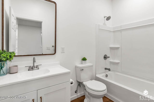 full bath with tub / shower combination, vanity, and toilet