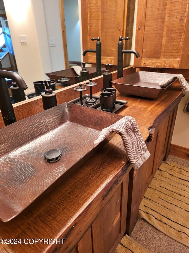 bar featuring a sink