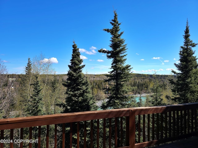 deck with a wooded view