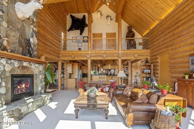 living room featuring rustic walls, wooden ceiling, high vaulted ceiling, and a stone fireplace