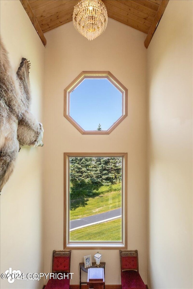 room details featuring a chandelier and wood ceiling