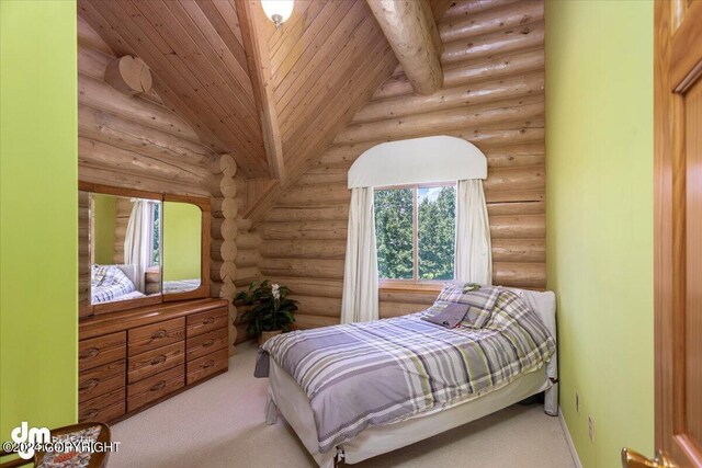 carpeted bedroom featuring wood ceiling and vaulted ceiling