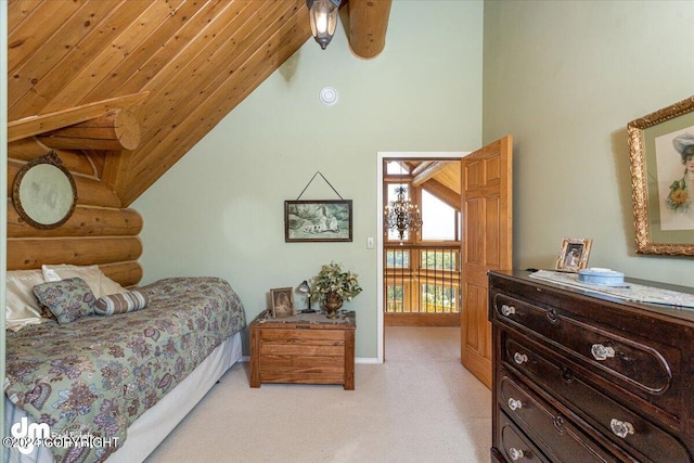 bedroom with baseboards, light colored carpet, wood ceiling, log walls, and high vaulted ceiling