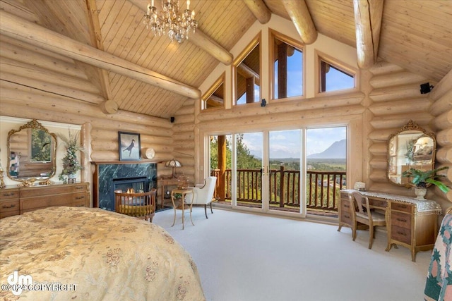 carpeted bedroom with wood ceiling, a premium fireplace, beamed ceiling, an inviting chandelier, and access to outside