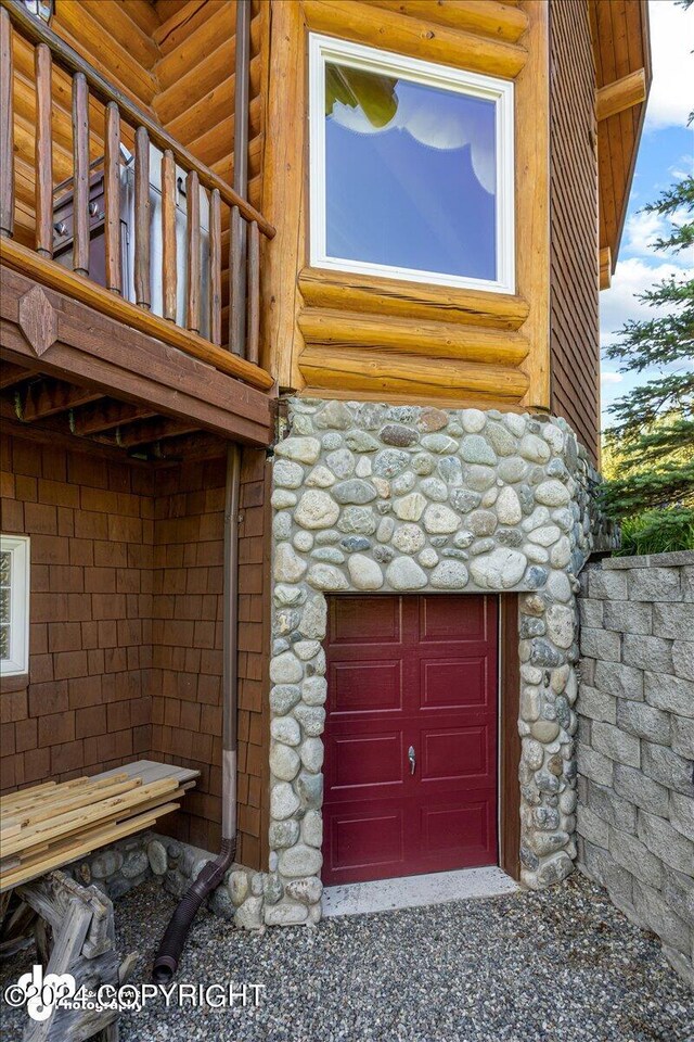 exterior details featuring stone siding