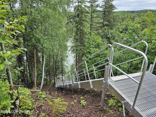 view of yard featuring a view of trees