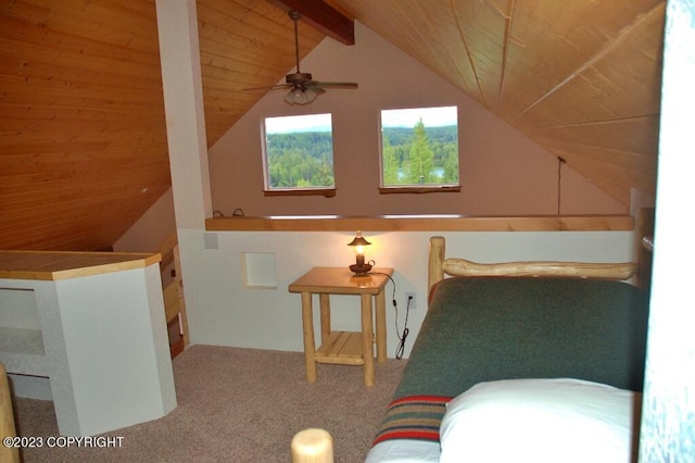 interior space with wooden ceiling and vaulted ceiling with beams