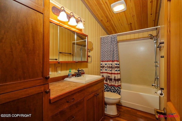 bathroom with shower / bath combo with shower curtain, toilet, wood finished floors, wood ceiling, and vanity