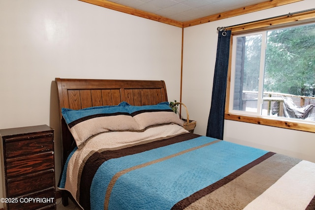 bedroom featuring multiple windows