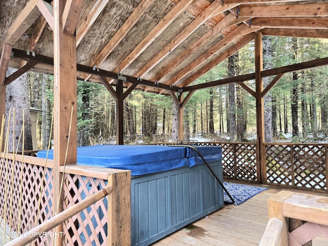 deck with a hot tub