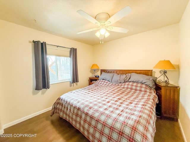 carpeted bedroom with baseboards and a ceiling fan