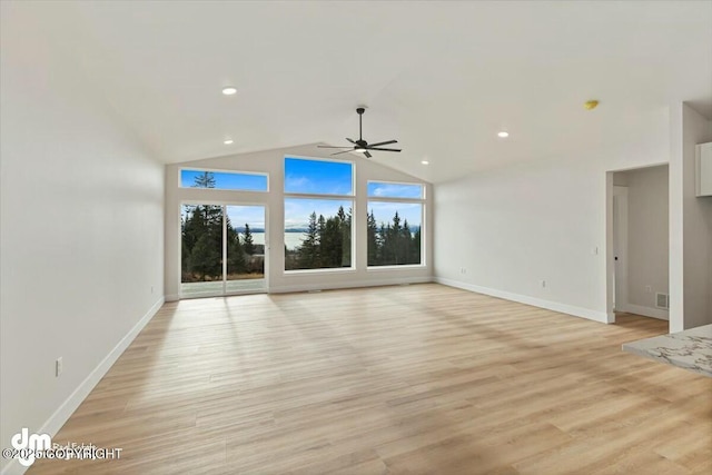 unfurnished living room with baseboards, high vaulted ceiling, recessed lighting, ceiling fan, and light wood-style floors