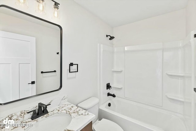 full bath with vanity, toilet, and tub / shower combination