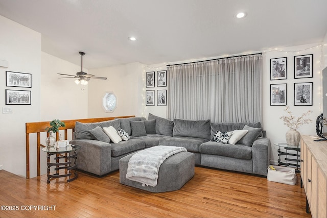 living area featuring a ceiling fan, light wood-style flooring, and recessed lighting