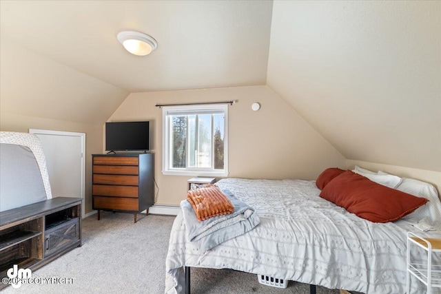 bedroom with vaulted ceiling, carpet flooring, baseboards, and baseboard heating