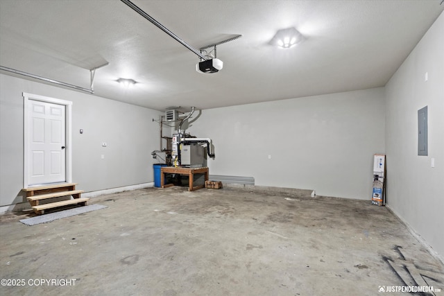 garage featuring electric panel and a garage door opener