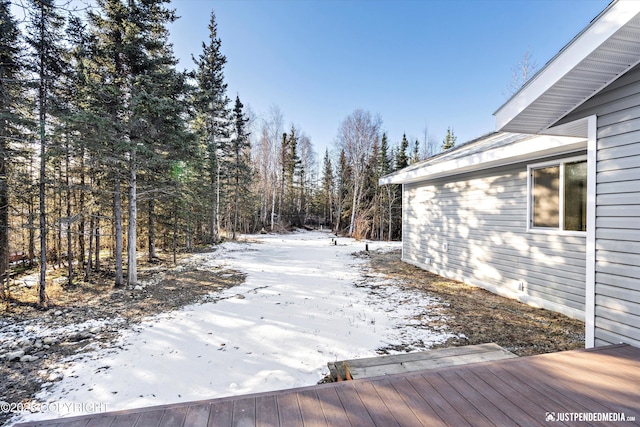 view of snow covered deck