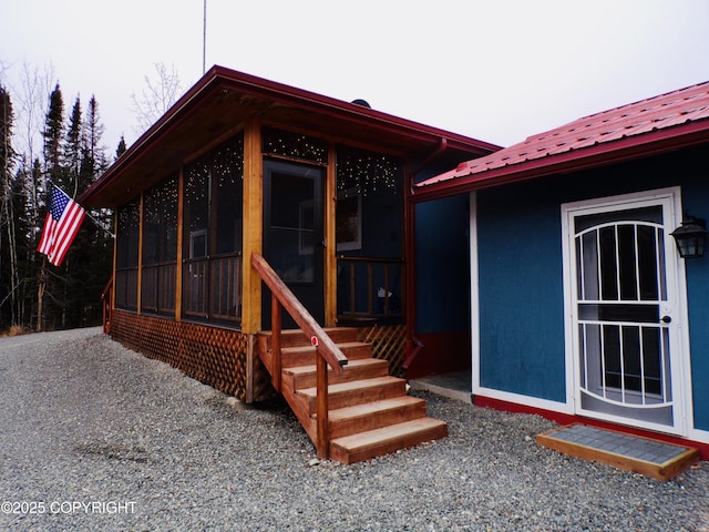 35376 Betty Lou Dr, Sterling, AK 99672 - exterior space featuring metal roof and a sunroom