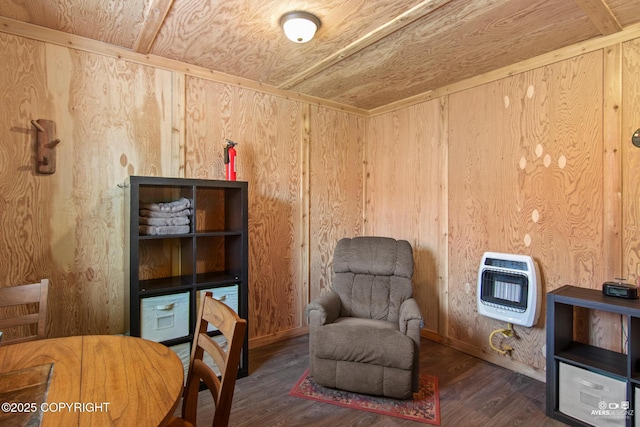 35376 Betty Lou Dr, Sterling, AK 99672 - living area featuring wooden walls, heating unit, and wood finished floors