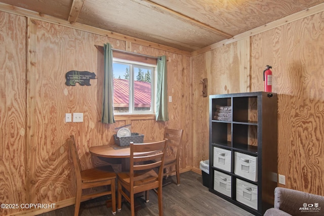 35376 Betty Lou Dr, Sterling, AK 99672 - dining space featuring baseboards, wood finished floors, and wood walls