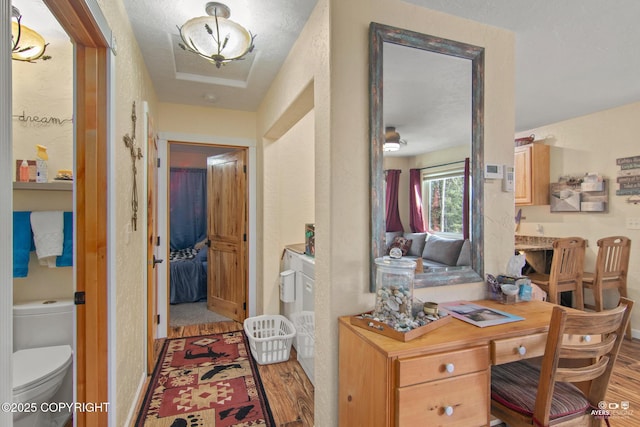 35376 Betty Lou Dr, Sterling, AK 99672 - interior space featuring a textured wall and light wood-type flooring