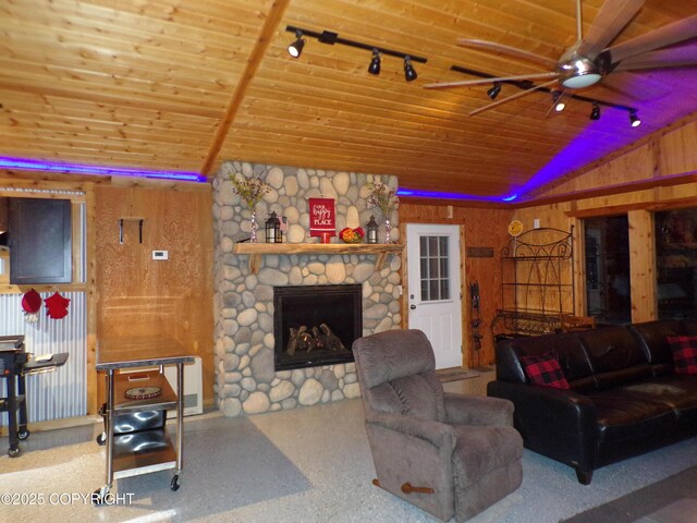 35376 Betty Lou Dr, Sterling, AK 99672 - living room featuring ceiling fan, wooden ceiling, a fireplace, and vaulted ceiling