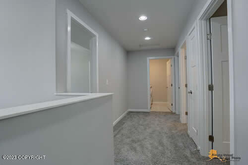 corridor with recessed lighting, baseboards, and carpet floors