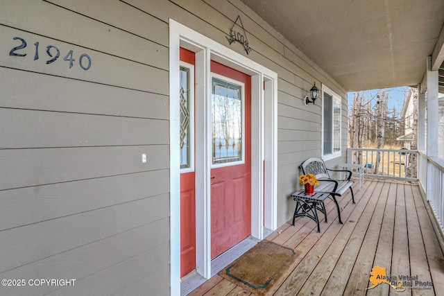 deck with covered porch