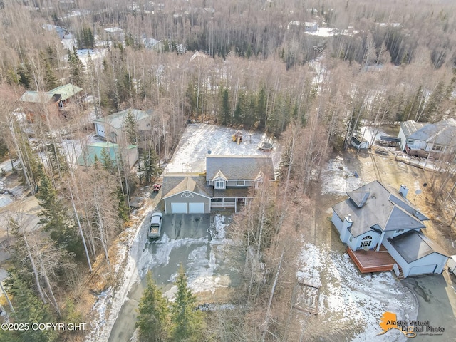 aerial view featuring a forest view