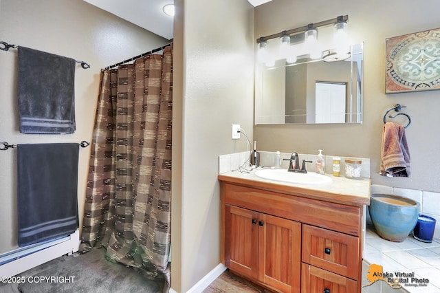 full bath featuring vanity and curtained shower